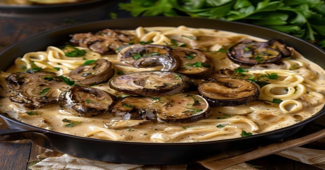 Vegan mushroom stroganoff with creamy sauce over pasta