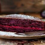 Here are concise, SEO-friendly alt text options under 120 characters: 1. Vegan red velvet cake with secret ingredient on wooden table 2. Moist vegan red velvet cake slice with hidden ingredient 3. Homemade vegan red velvet cake featuring unique secret ingredient 4. Rich vegan red velvet cake recipe with surprising secret ingredient 5. Decadent vegan red velvet cake slice showing secret ingredient 6. Easy vegan red velvet cake made with special secret ingredient 7. Fluffy vegan red velvet cake with unexpected secret ingredient 8. Best vegan red velvet cake recipe featuring secret ingredient 9. Vibrant vegan red velvet cake slice with hidden secret ingredient 10. Perfect vegan red velvet cake made with special secret ingredient